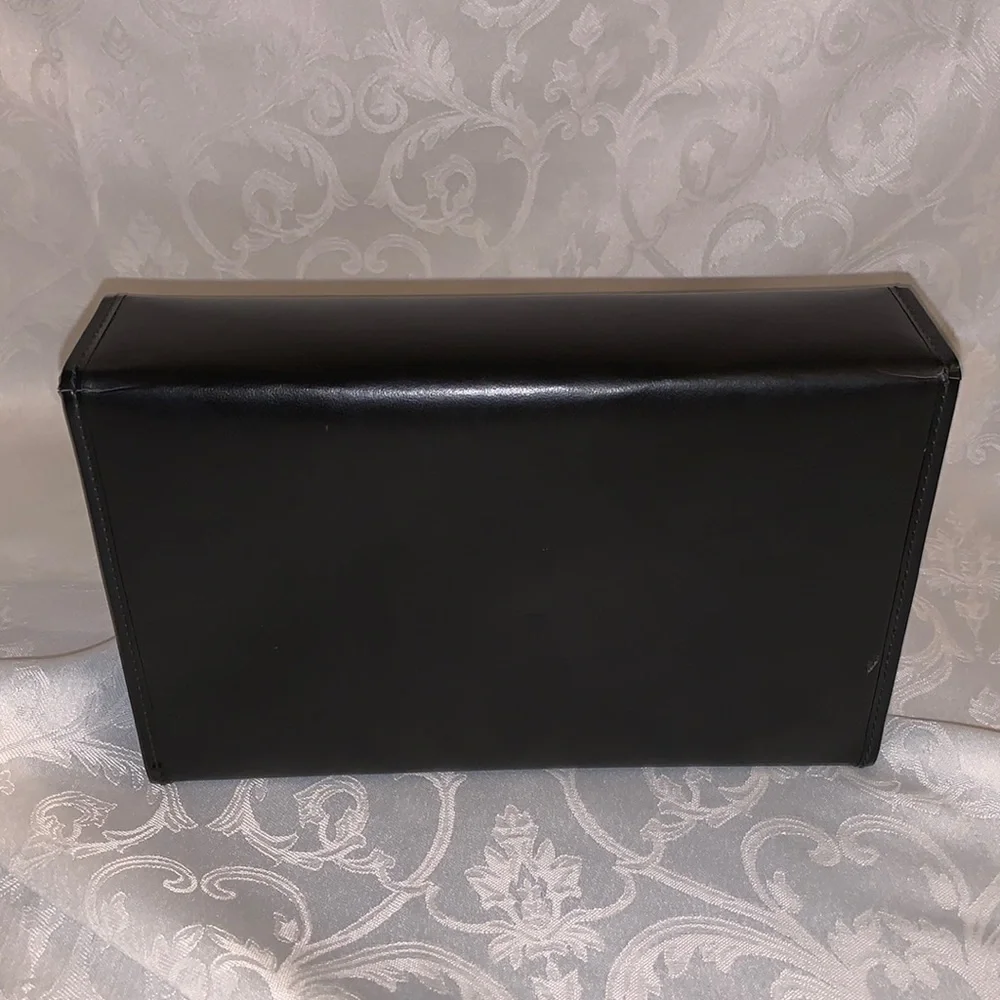 Vintage men’s grooming set in a black case and red interior